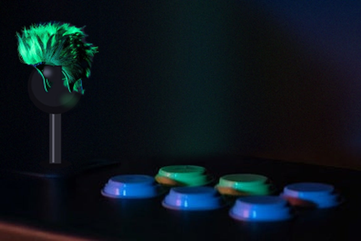 WigSticks Radioactive Glow: glowing green mohawk on an arcade ball-top joystick